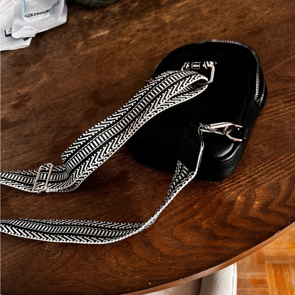 Black Vegan leather cross body bag. It has a few compartments can hold phone - Picture 4 of 4